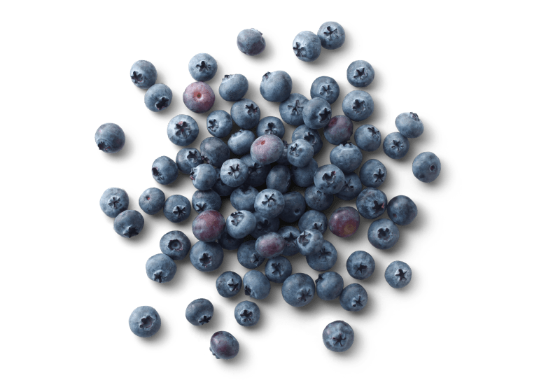 A handful of Cascadian Farm blueberries scattered on a table