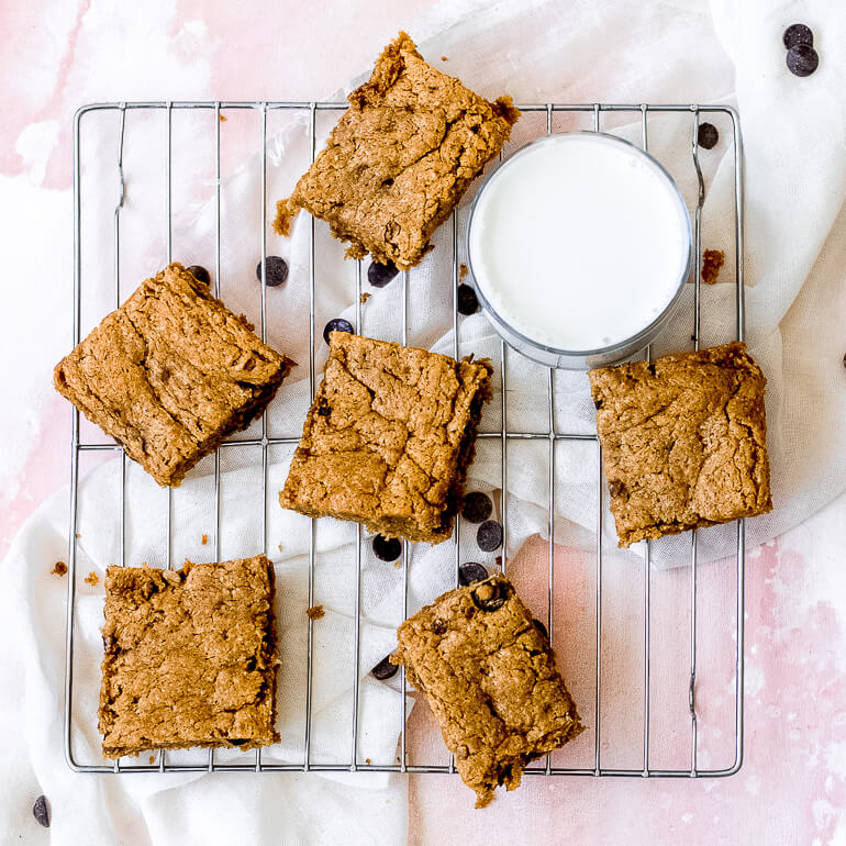 Almond Butter Granola Blondie Bars cooling on a wire rack