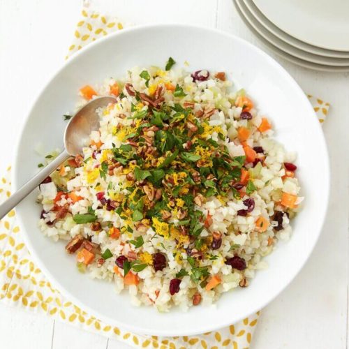 Recipe image of a bowl of pecan dried cranberry cauliflower rice