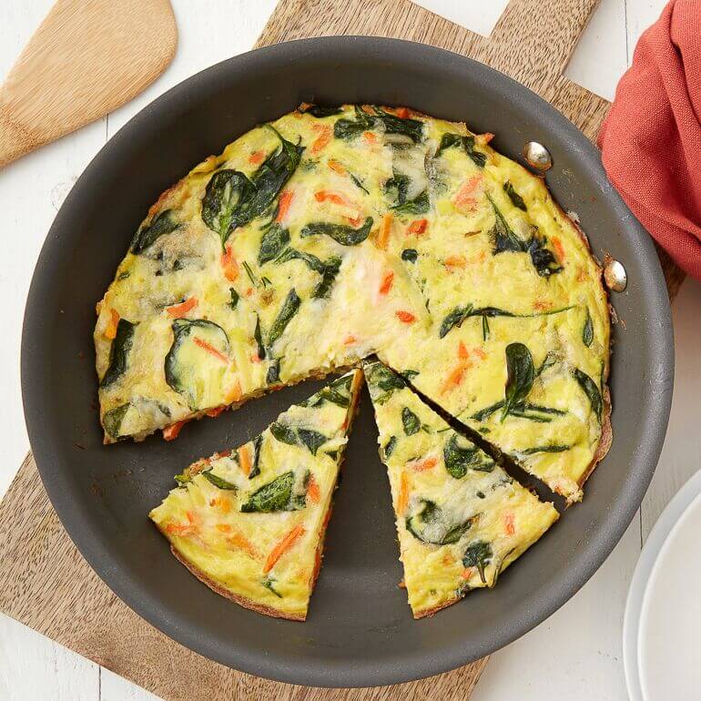Image of a skillet with root vegetable hash frittata, for the recipe